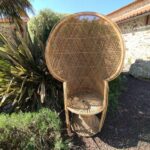 Fauteuil en rotin naturel en location pour cérémonie laïque et mariage bohème chic