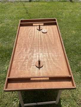 table à glisser en bois en location WeLocation Vendée