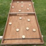 table à l’élastique en bois en location WeLocation Vendée