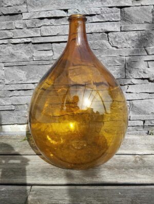 Grande Dame-Jeanne en verre vert pour décoration mariage, événement ou ambiance bohème